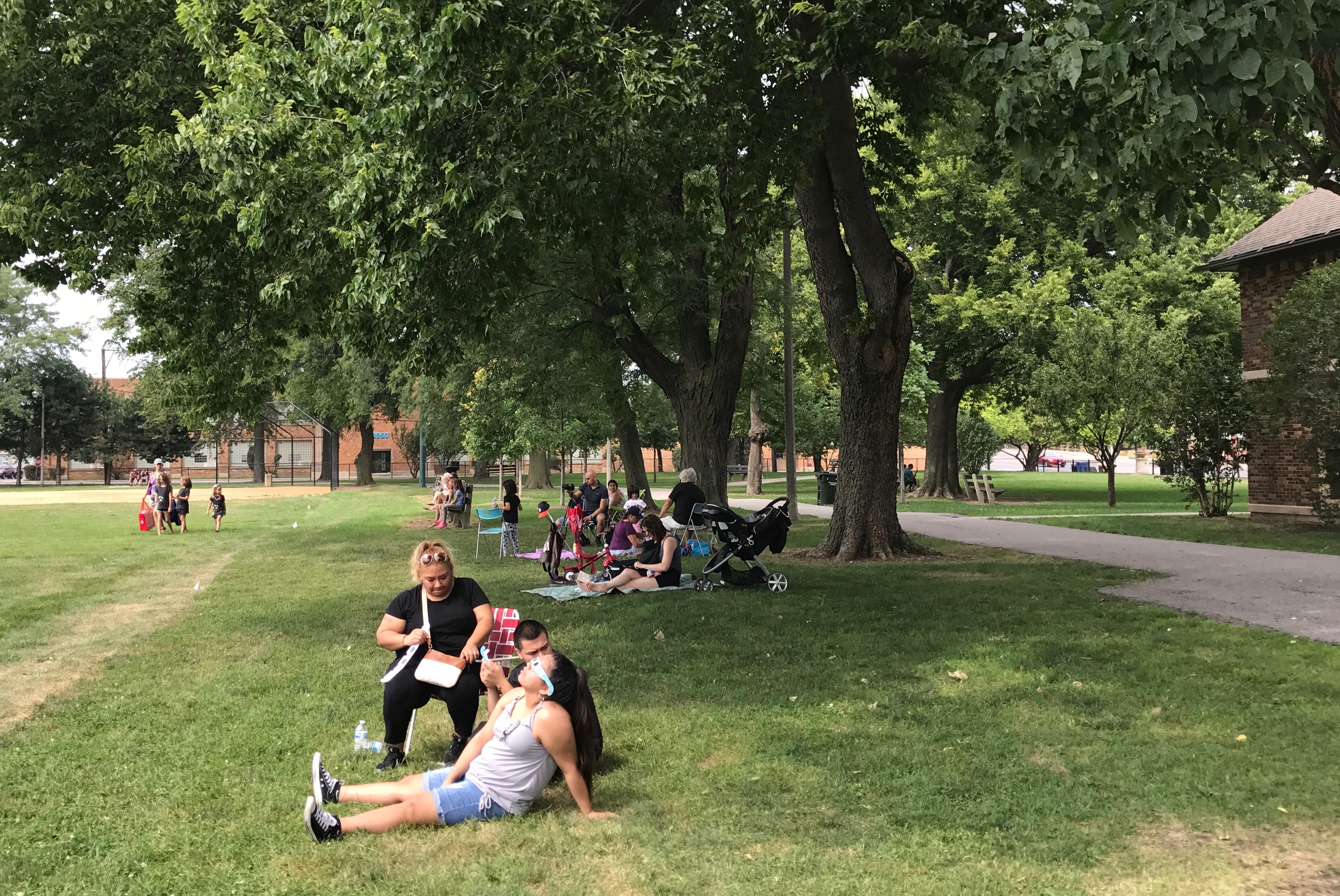 Waiting for the eclipse at Revere Park. Photo: John Greenfield