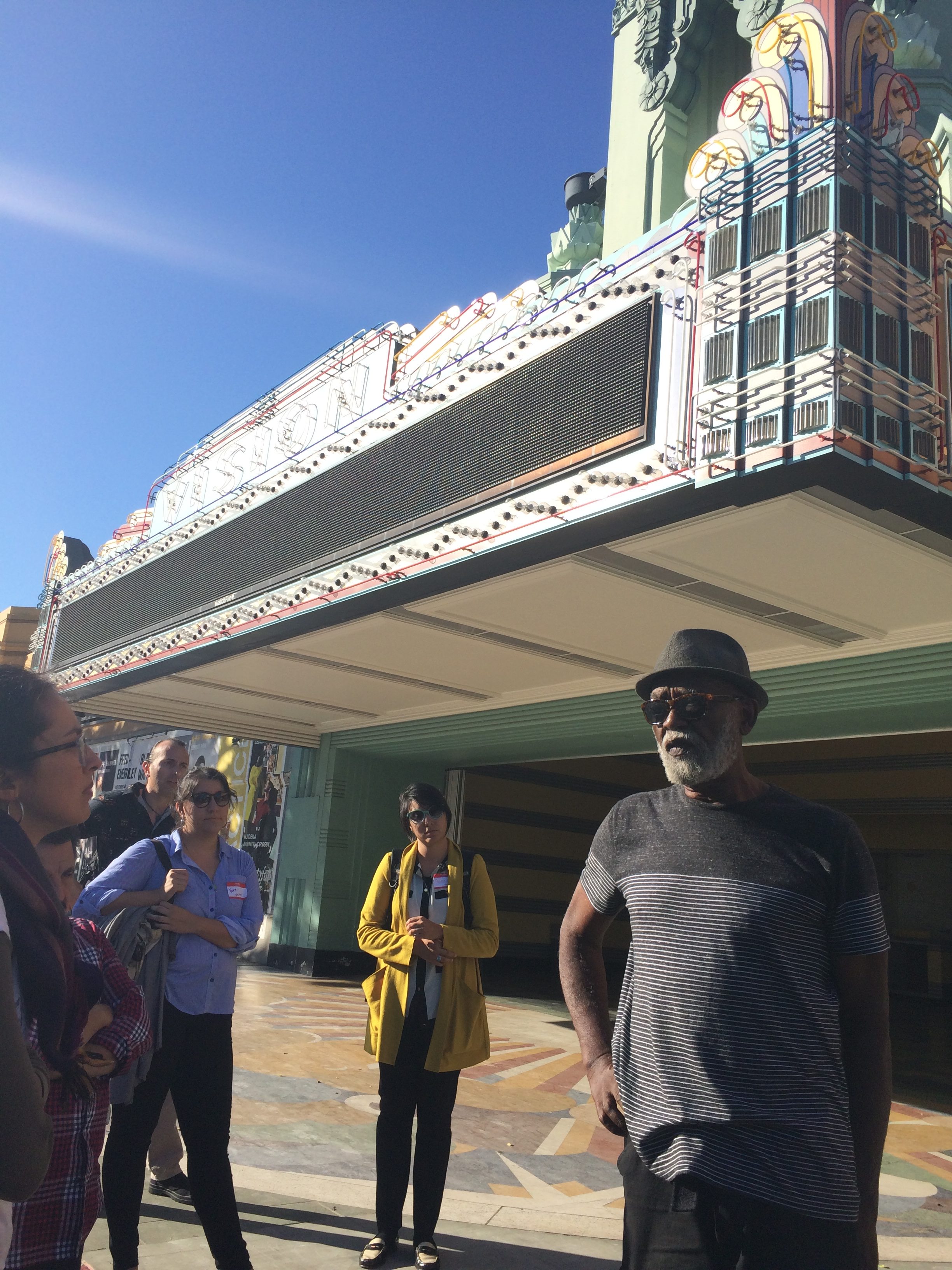 A longtime Leimert Park resident leads Untokening participants on a tour of the neighborhood. Photo: Lynda Lopez