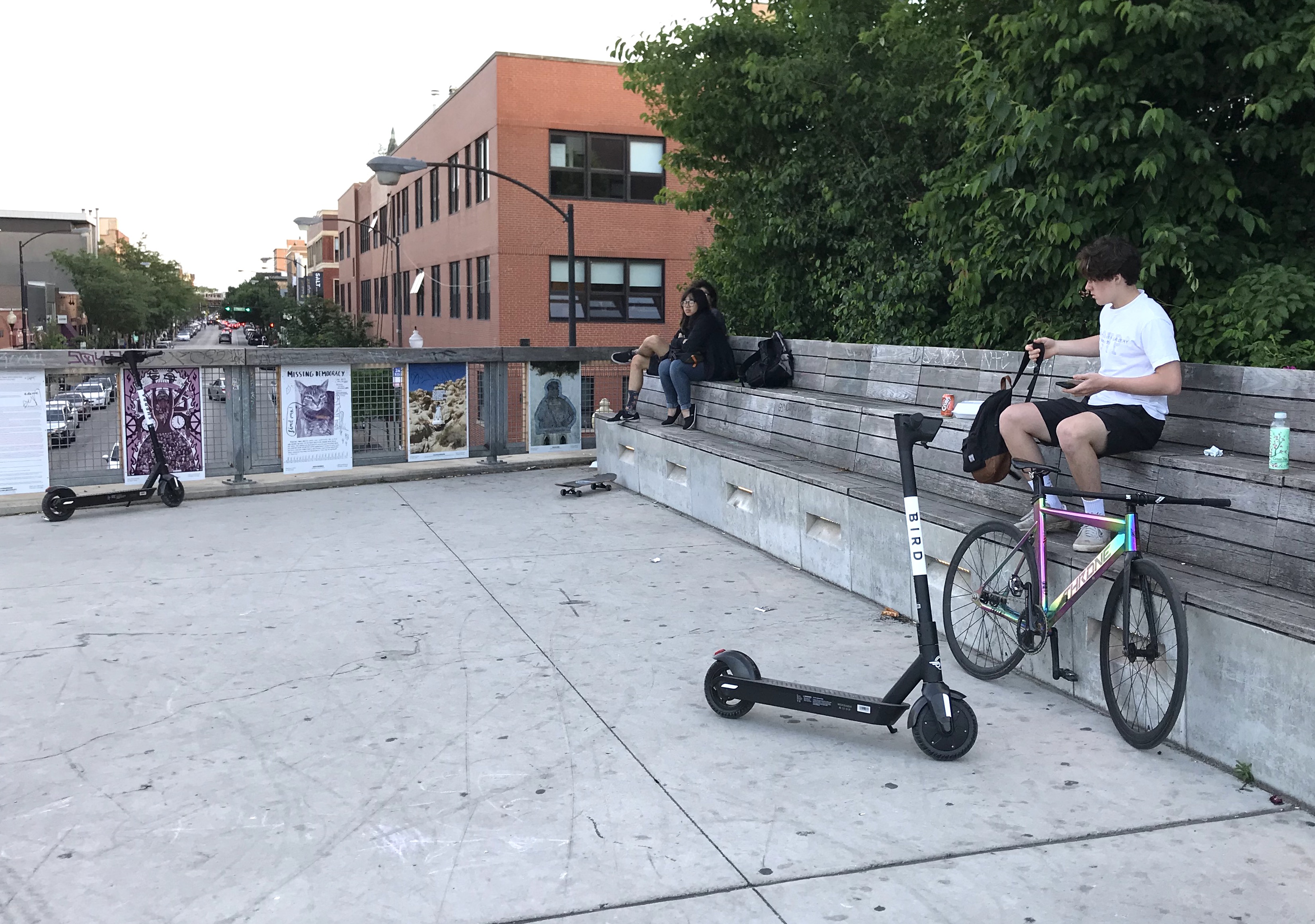 Scooters left on a plaza of the Bloomingdale Trail at Damen Avenue. Photo: John Greenfield
