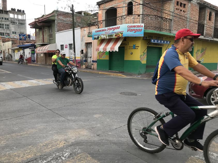 Motorcycle riders and cyclist in Tanhuato. Photo: John Greenfield