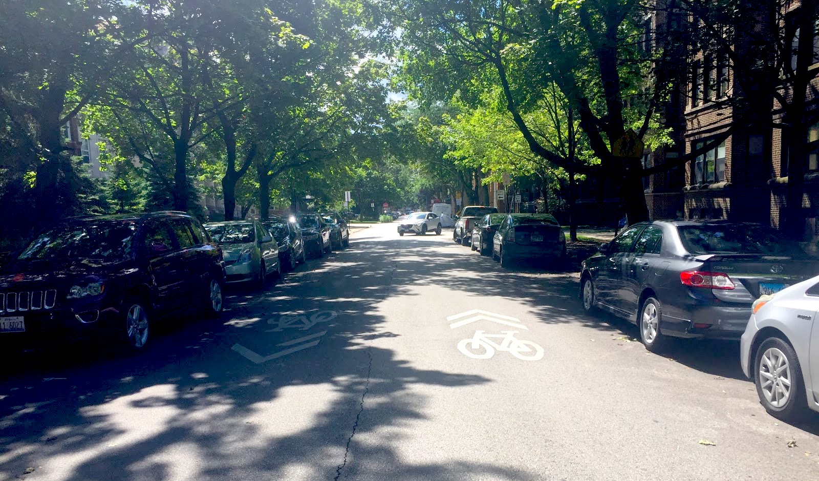 Glenwood Avenue from Devon to Pratt is pretty narrow. It's not uncommon for drivers to have close-calls. Cyclists are forced closer to parked cars when large vehicles are moving in the opposite direction.Photo: Courtney Cobbs