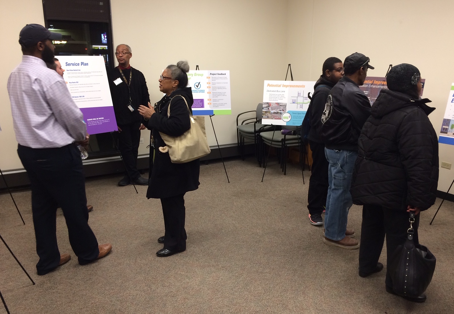 Attendees talk with CTA reps and check out displays at the meeting. Photo: James Porter