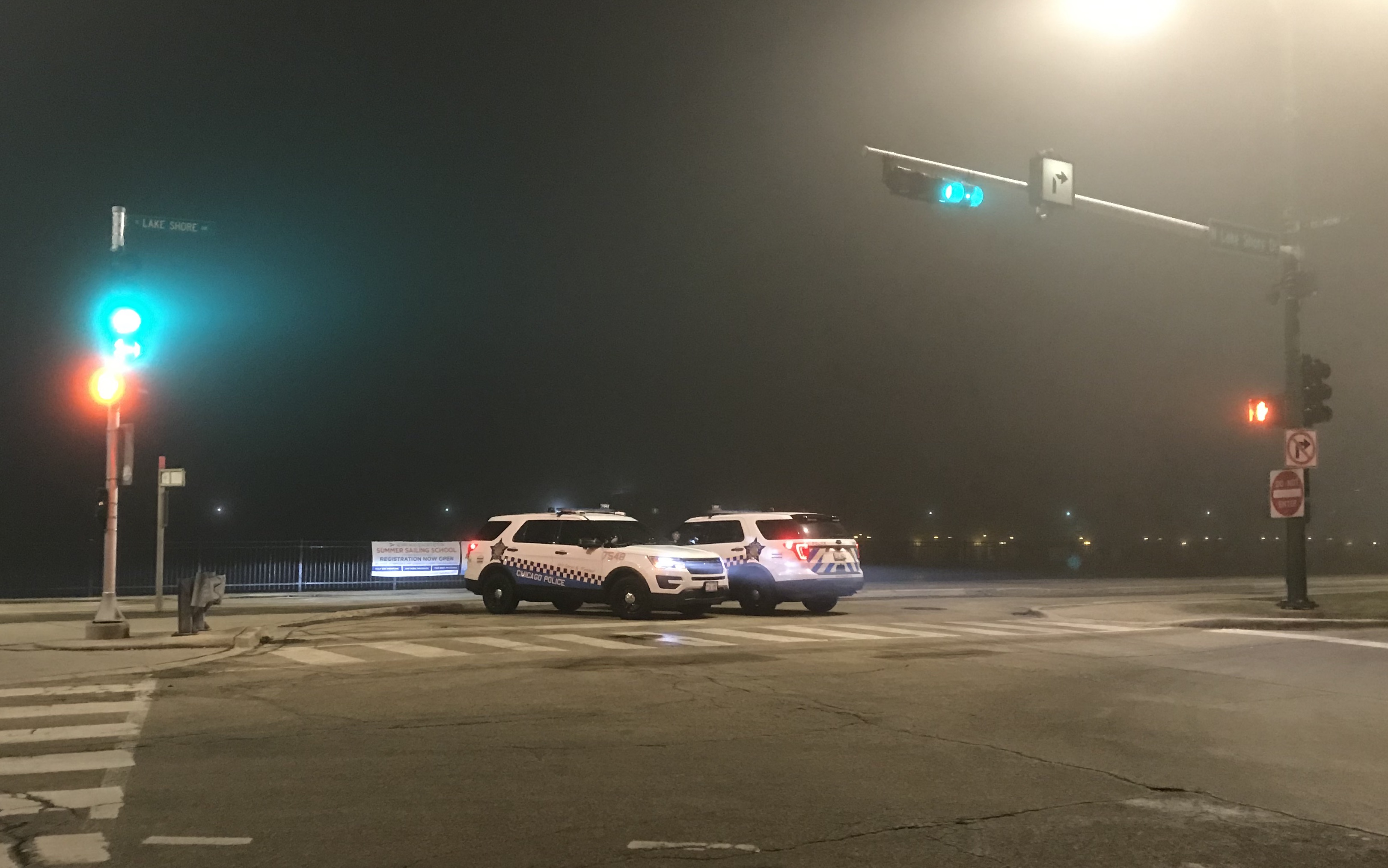 Police officers guarding the Belmont entrance of the Lakefront Trail on Thursday night. Photo: John Greenfield