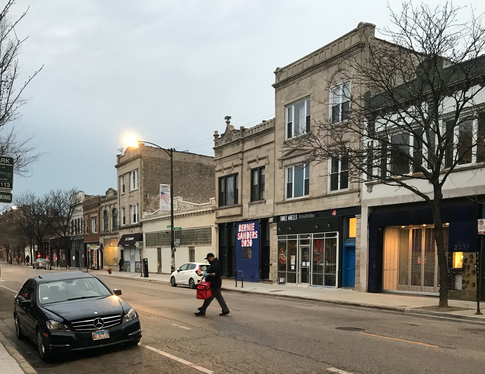A delivery driver in Logan Square. Photo: Ariel Parella-Aureli