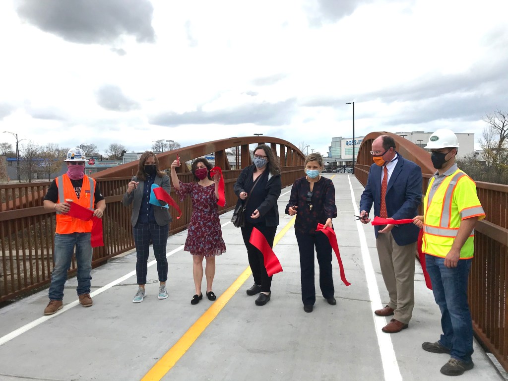 Stone free! City finally cuts the ribbon on the bike bridge that Berny Stone blocked