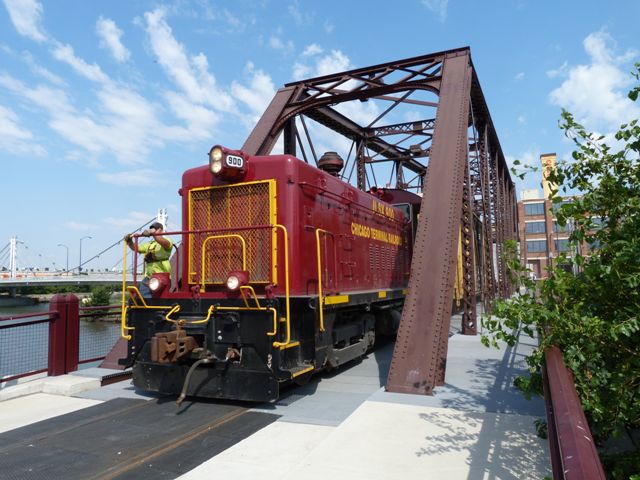 Don’t you just hate when there’s a freight train in the bike lane? Between 2009 and 2015, this was a common sight on the bike route that is the Cherry Avenue Bridge. Photo: Nathan Holth.