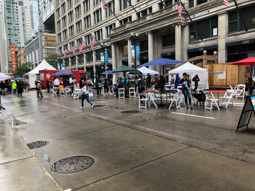 Eyes on the street: Despite the rain, plenty of people attended the first Sundays on State