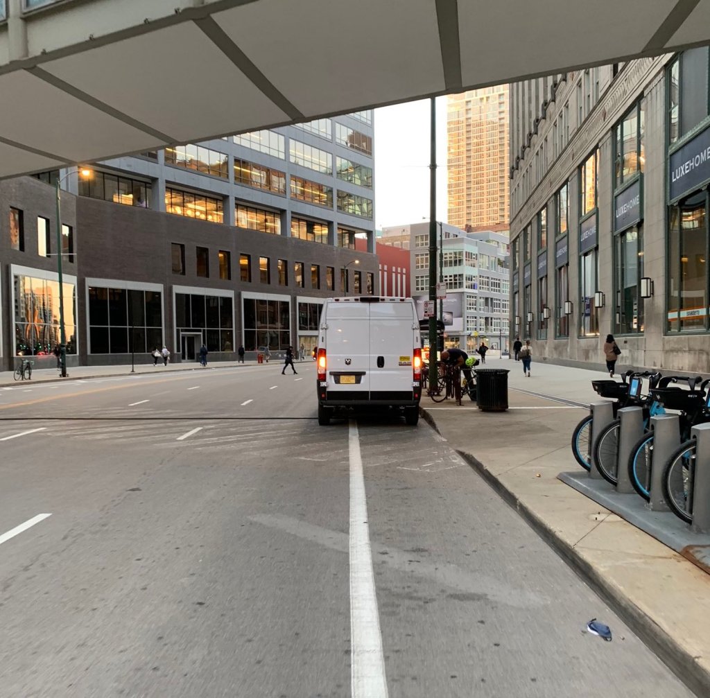 What should drivers do to avoid blocking bikeways – especially bike-share workers?