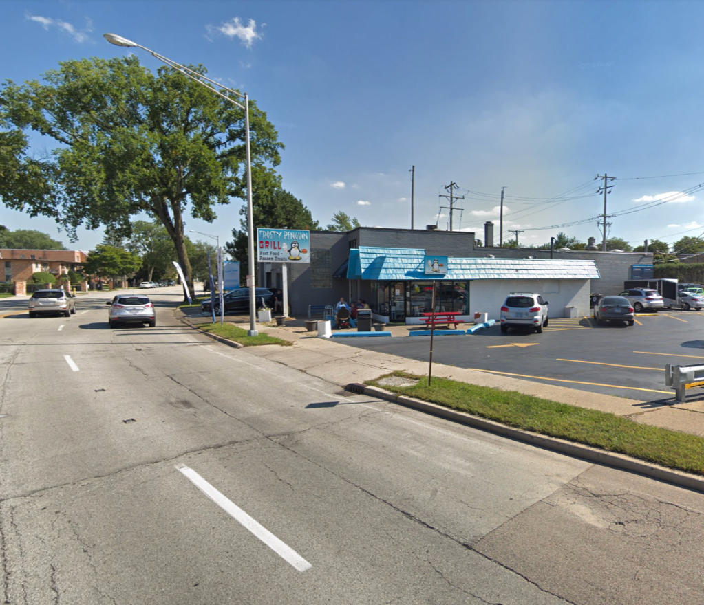 IDOT wants to strip parking for bike lanes. Merchants push back. Both sides are wrong.