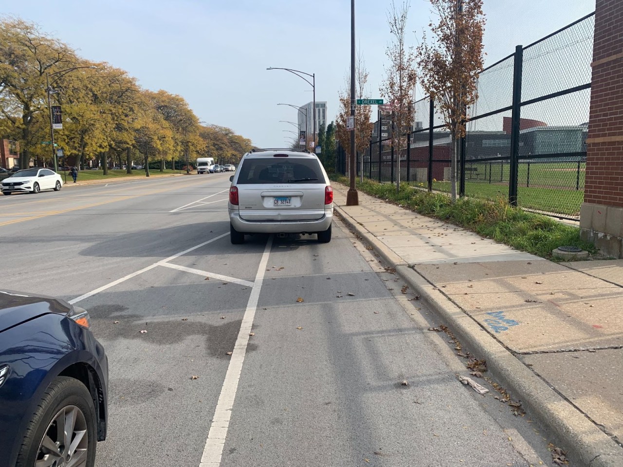 Car parked in bike lane bus stop at 55th St. and Drexel Ave. Photo: Steven Lucy