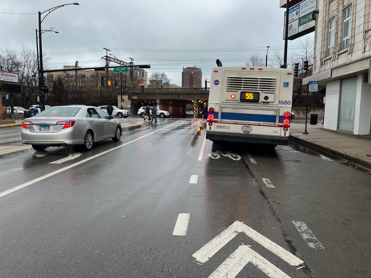 Bus blocking the bike lane at 55th St. and Lake Park Ave. looking east. Photo: Steven Lucy