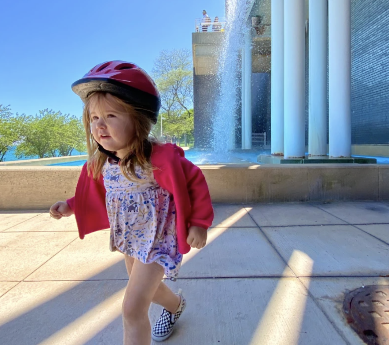 Lily Grace Shambrook by a fountain at McCormick Place during a bike ride on the Lakefront Trail. Photo: Provided