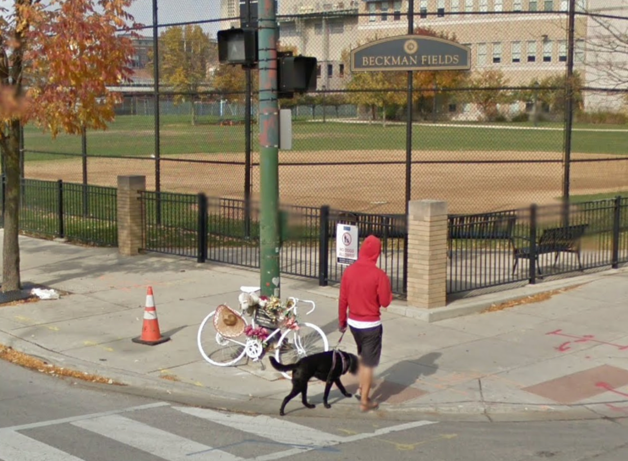 Ghost bike memorial for attorney Neill Townsend, 32, at the southeast corner of Payton High. Townshend was biking south on Wells in October 2012 when a motorist opened their door in his path, Townshend swerved out of the way, and he was run over by a semi driver.