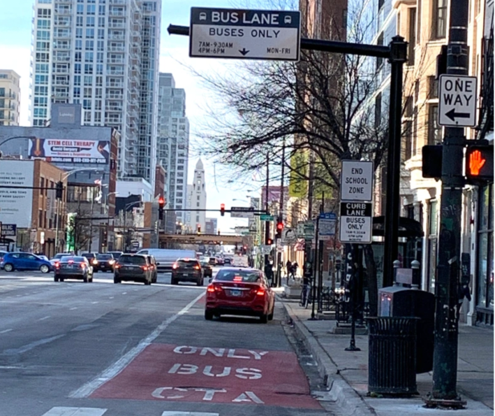 A driver blocks a Chicago Avenue bus lane near Clark Street in River North. Photo: CDOT