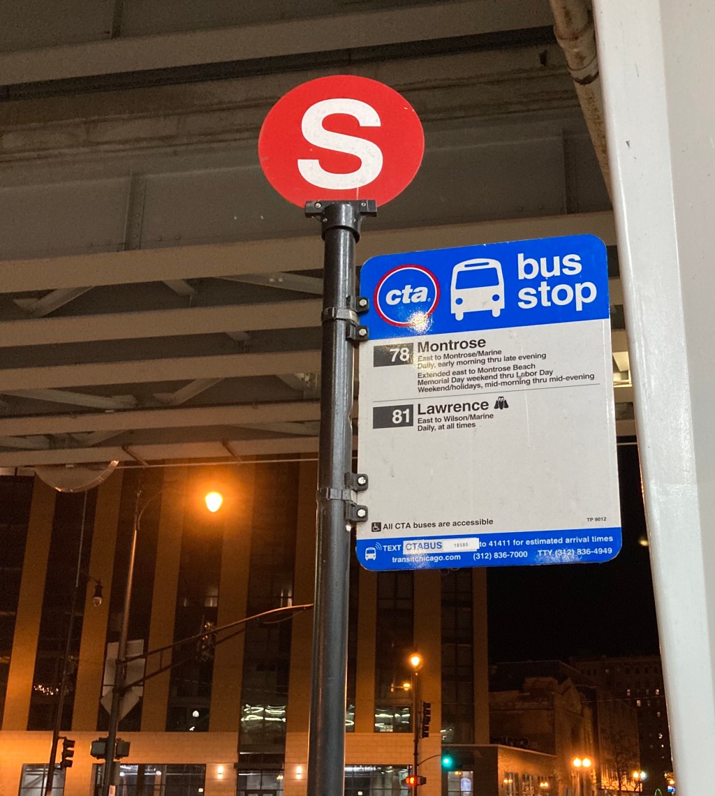 What’s up with those red circular signs on top of CTA bus stop signs?