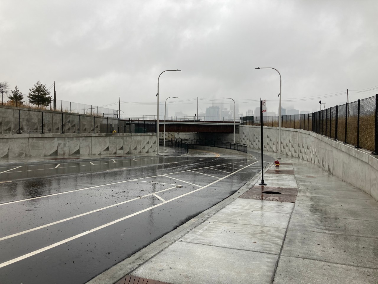 View of the Wells-Wentworth connector through the construction fence on Wentworth north of 18th Street. Photo: John Greenfield