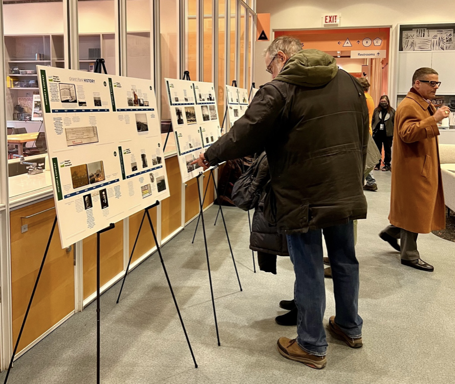 Attendees look at the history of Grant Park timeline as they enter the open house. Photo: Olivia Grenzebach