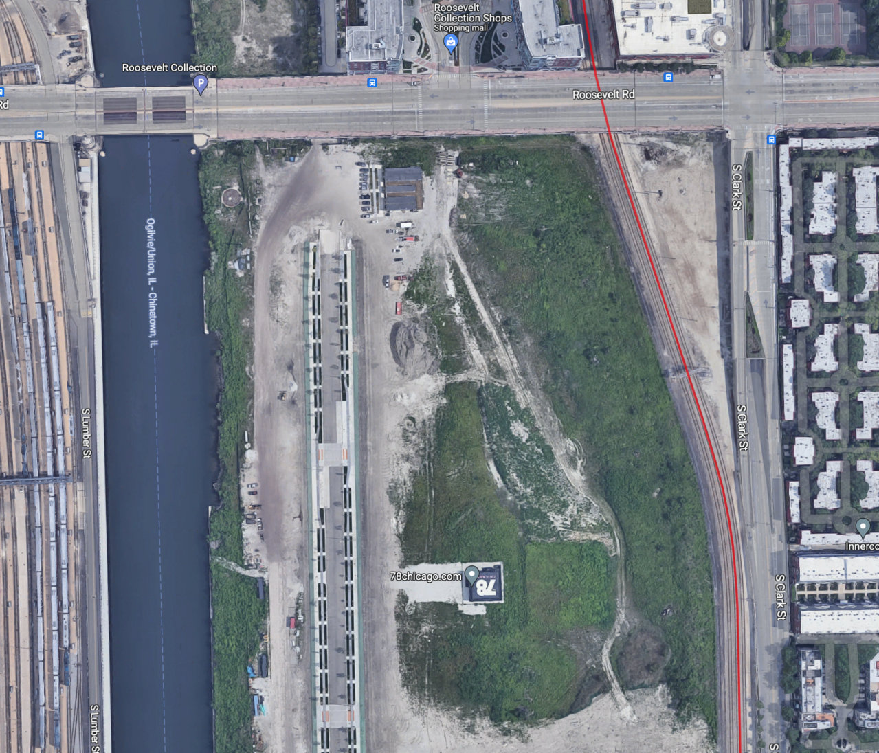 Aerial view of the Well-Wentworth connector under construction. The raised bike lanes are visible as gray lines between the dark dashes, which are soil beds that are getting landscaping. Image: Google Maps