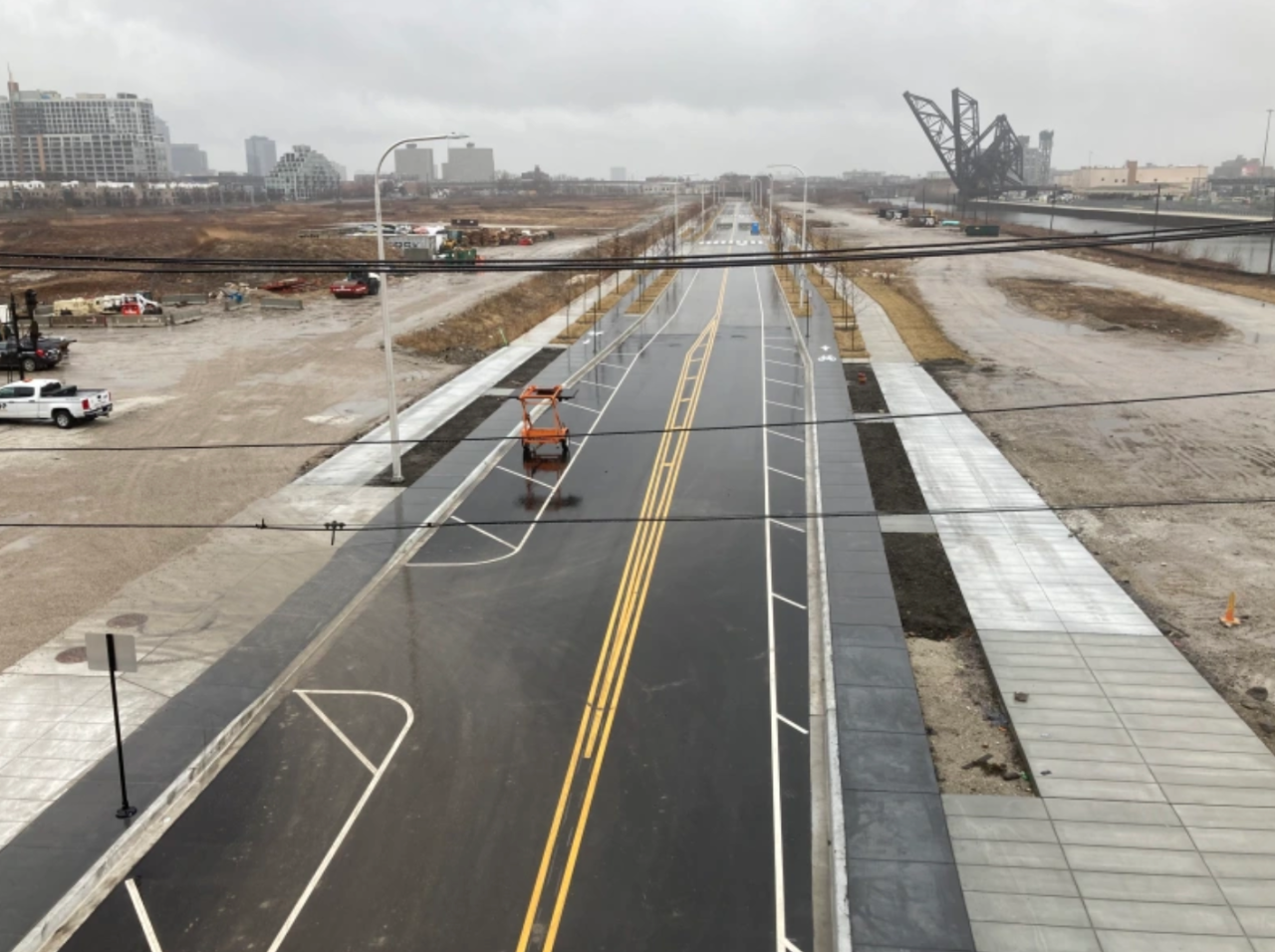Raised bike lanes on the Well-Wentworth connector, as seen from Roosevelt Road, looking south. Sign poles have been installed in the bike lanes. Photo: John Greenfield