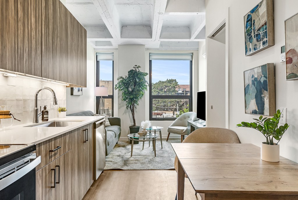 Parking spots are turned into people space as a Lakeview garage becomes an apartment complex