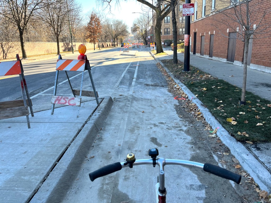 Concrete protection comes to Clark bike lanes north of Berteau, which will help keep drivers from blocking them