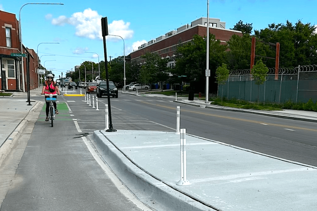 This is Grand! CDOT cuts ribbon on new protected bike lanes on a key West Side diagonal street