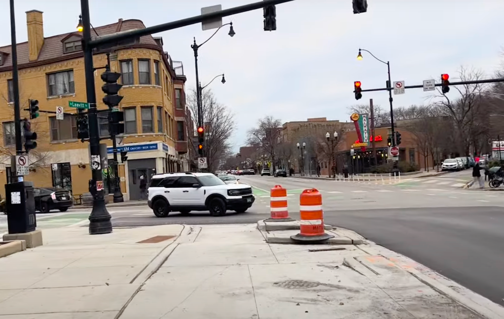 Get a pizza the action: Take a virtual ride on the new raised bike lane across from Lou Malnati’s on the Leavitt Street Greenway
