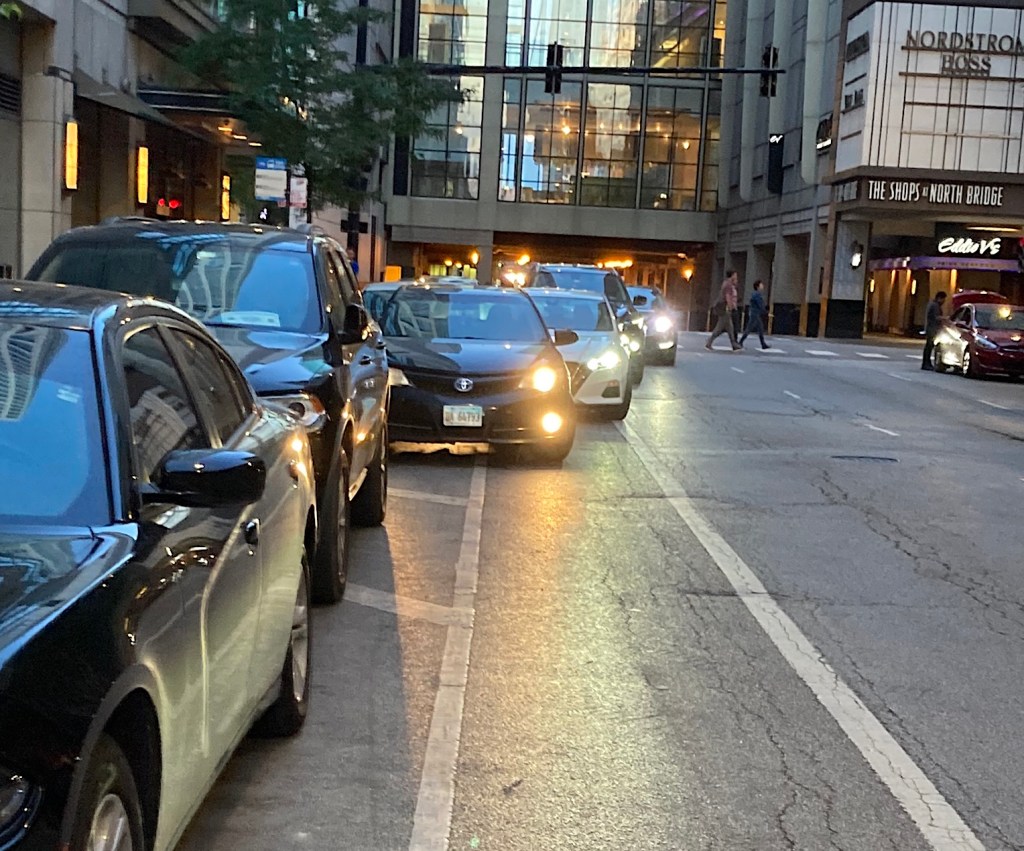 Uber Eats driver: City pricing  and managing curb space, and companies being transparent about pay, could make streets safer, more efficient