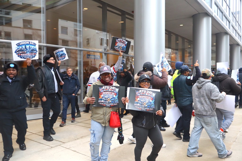 Inside CTA HQ, board discussed Revised Security Enhancement Plan. Outside, rallying bus drivers chanted “Respect us, protect us, pay us.”