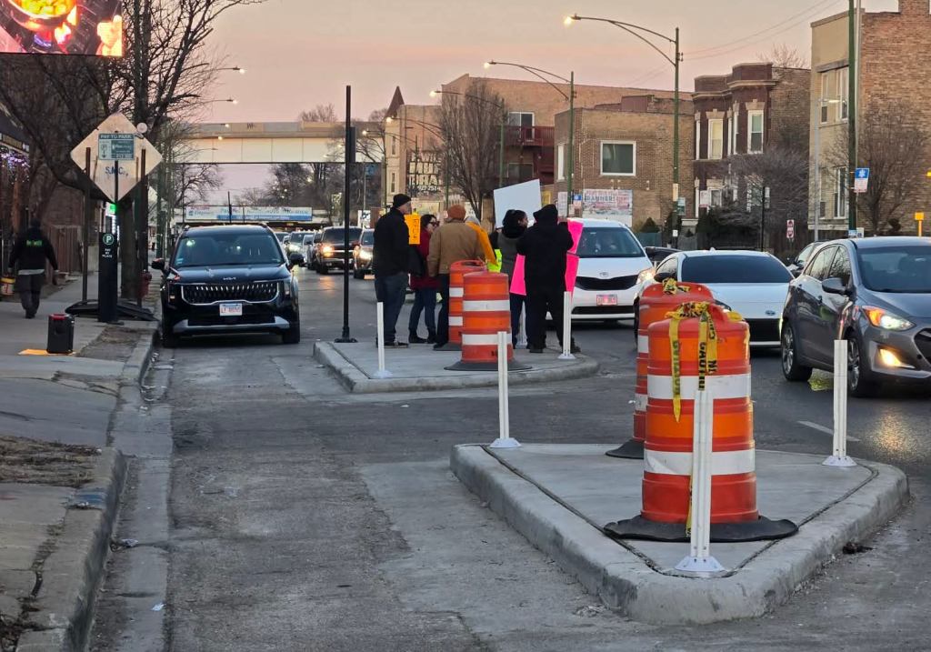 After drivers struck 2 bike and scooter riders on Archer in less than a month, project foes absurdly claim half-done, car-clogged “bike lanes didn’t help”