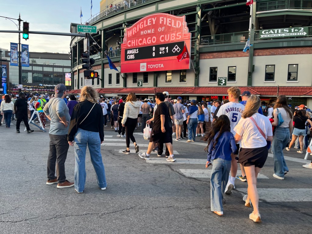 The Cubs defended the revised Wrigleyville parking lot expansion plan, but neighbors are still calling foul