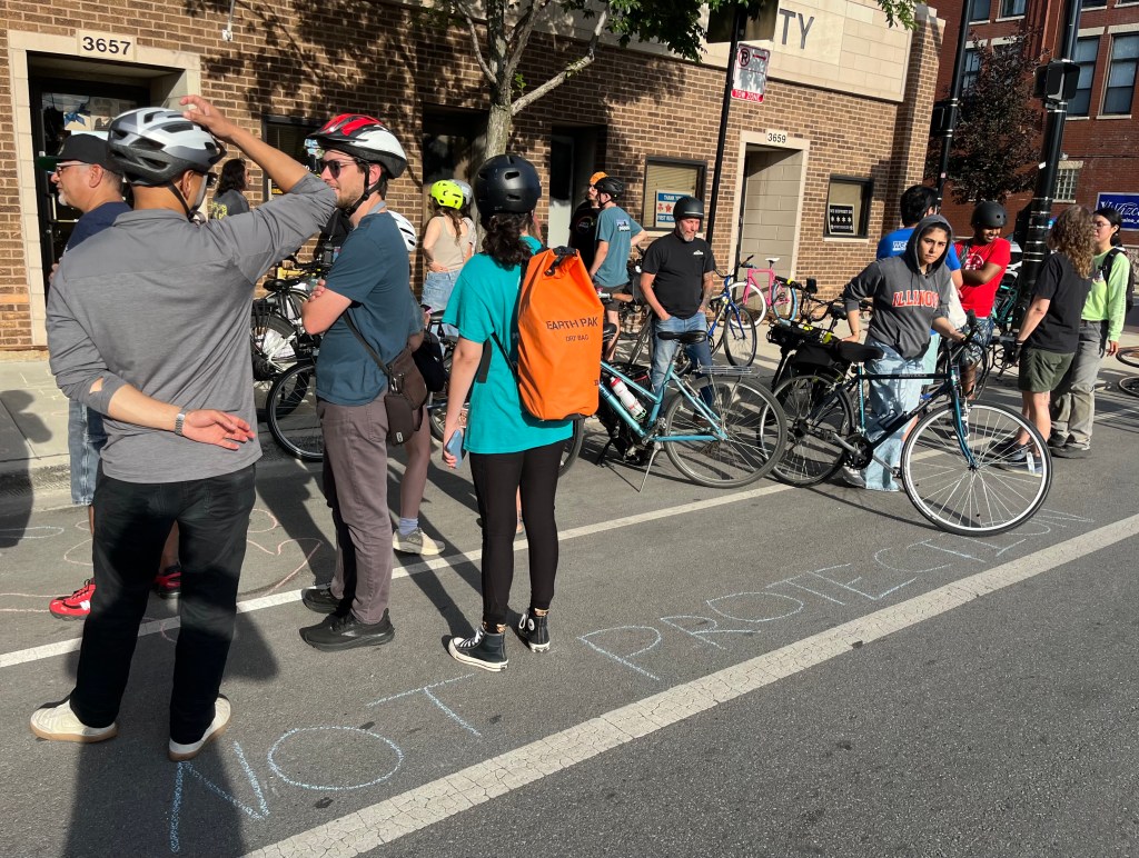 Complete Streets planner Riley O’Neil died in a paint-only bike lane. Protesters say we must value people over parking.